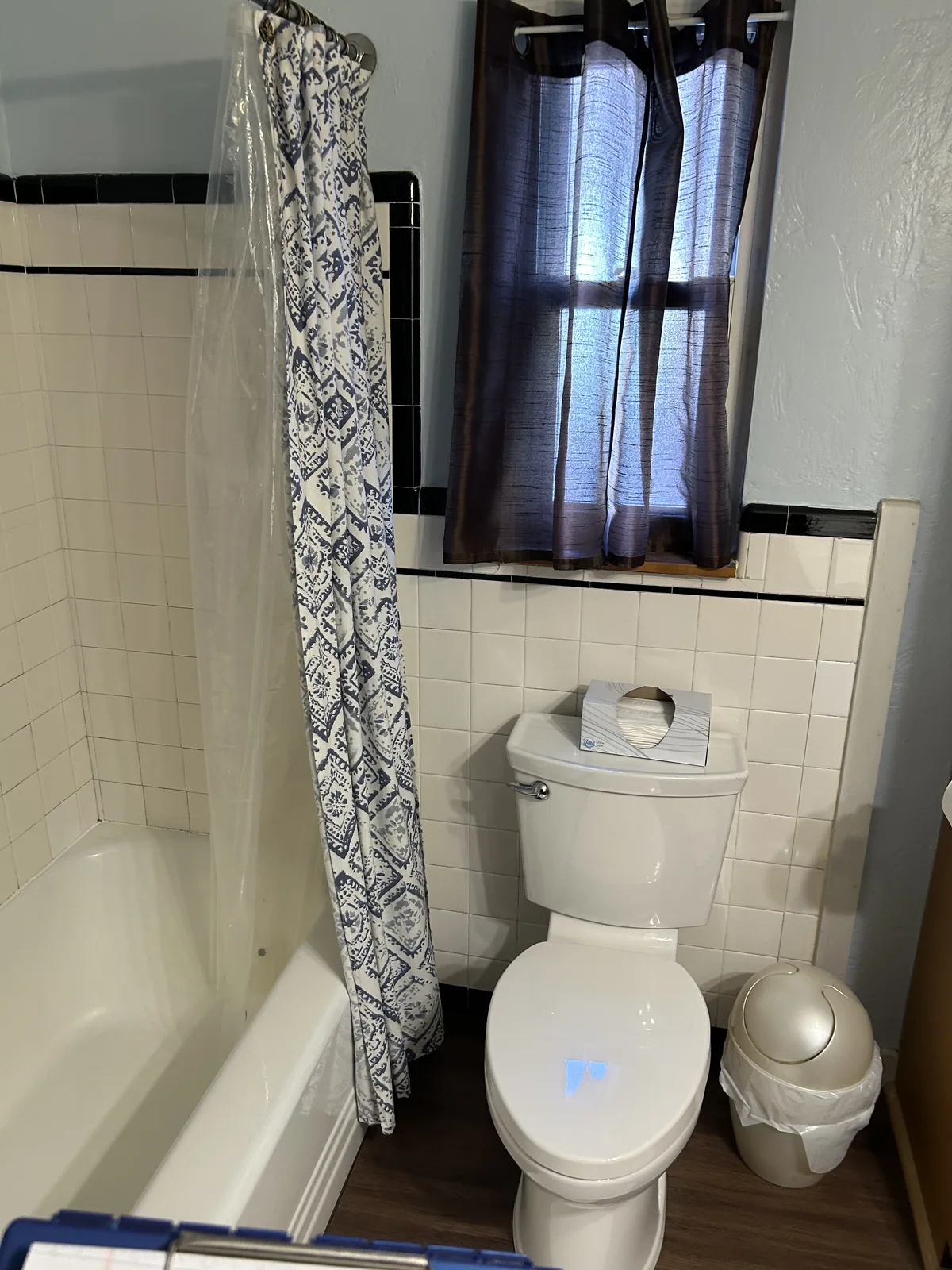 Completed bathroom with a tiled walk-in shower and new toilet