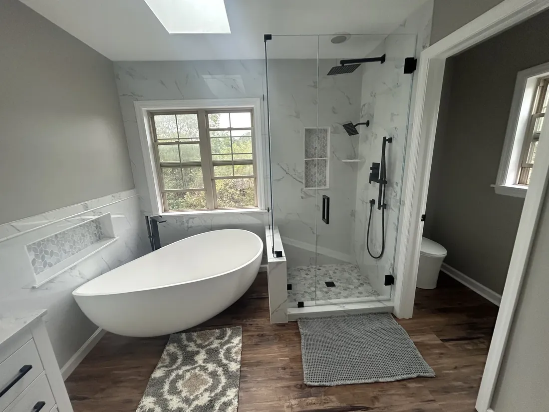 Primary bathroom remodel with a freestanding tub and glass walk-in shower